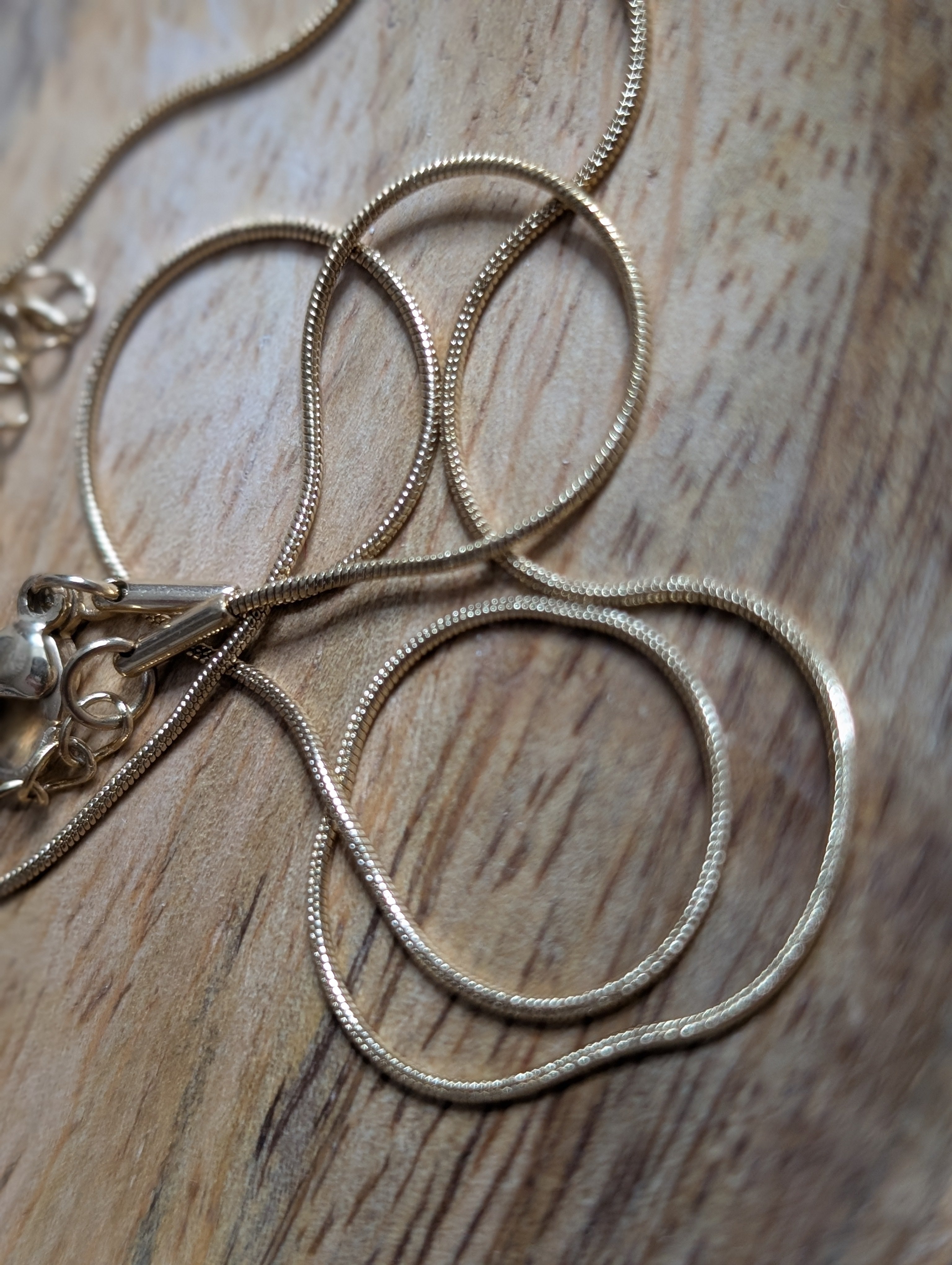 Schlangenkette Edelstahl, goldfarben (0,9 mm)